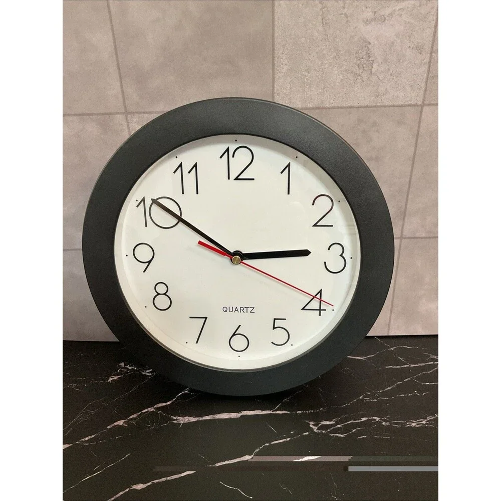 Universal Wall Clock 9 3/4 In Diameter Black Case